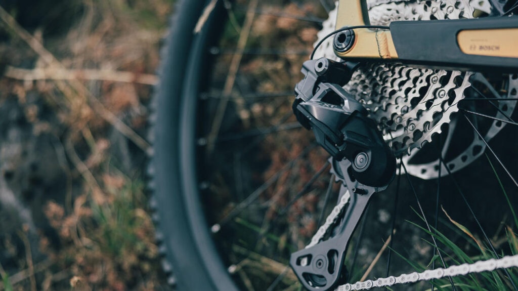 Cube Reaction Hybrid 2027 Modelle Neuheiten im Vergleich SLX 800 autumn´n´black Detailbild Hinterrad